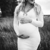 Black and whtie image of Emerlie - white maternity dress rental photoshoot