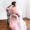 Light pink colored maternity dress photoshoot