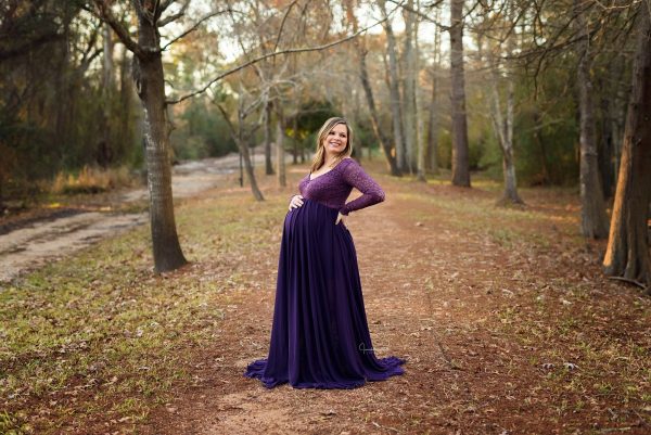 Eggplant purple colored longlseeve maternity dress photoshoot in the woods