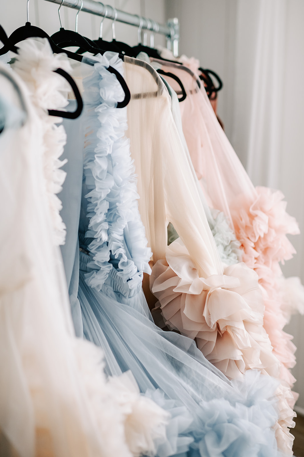 Details of ruffles on maternity gowns from Mama Bump Rentals